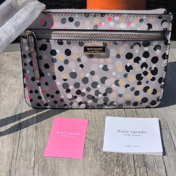 kate spade Handbags - Kate Spade Shore Street Grey Multi Wristlet NWT